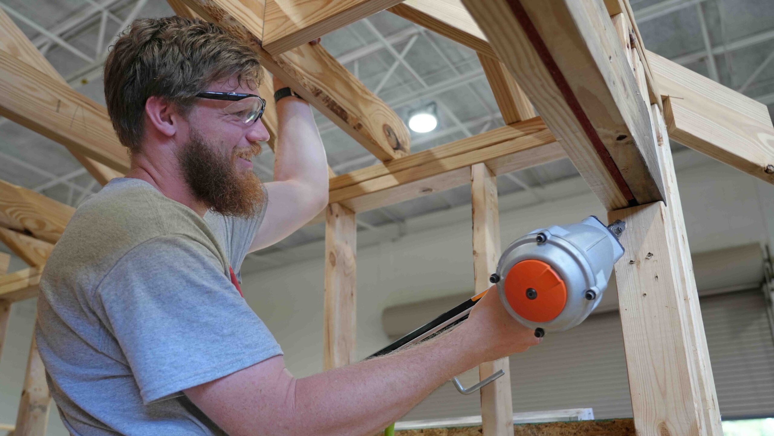 A student learning framing carpentry.