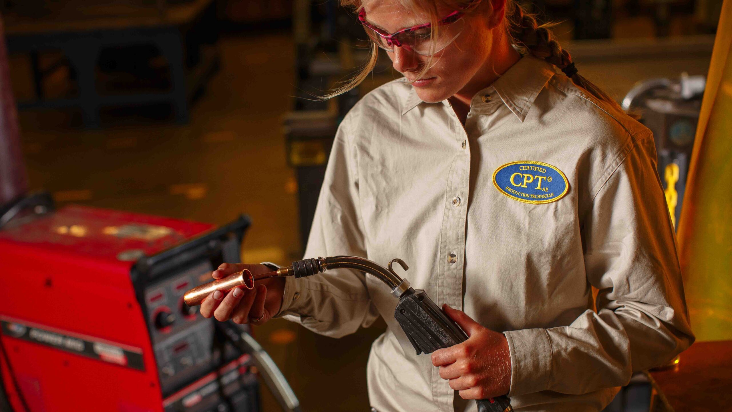 A student preparing a welder.